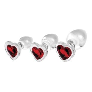 Three dimensional red heart anal plug. First explore the pleasure of the backdoor with the glittering base of these Red Heart anal plugs available in small, medium and large. ! Made from non-porous, body-safe glass, this teardrop-shaped anal plug is designed for a smooth experience.