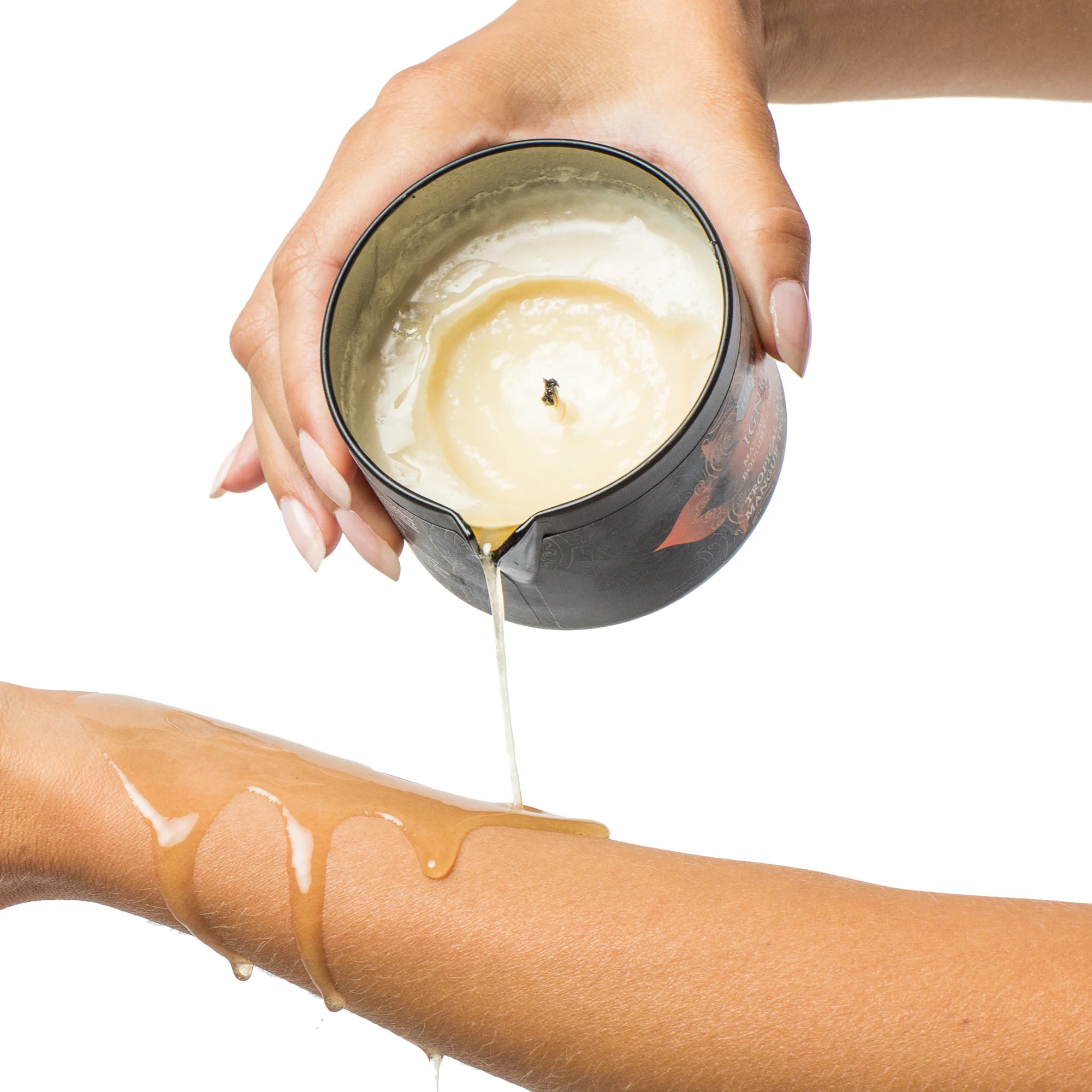 The oil can be poured into the hands using the spout.