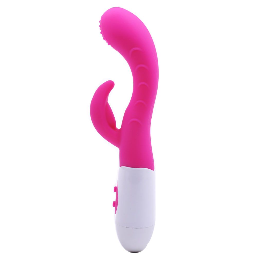 Vibrateur charmeur double Pinky très silencieux avec forme recourbé possédant deux moteurs pour une stimulation intense du point-G et du clitoris.
